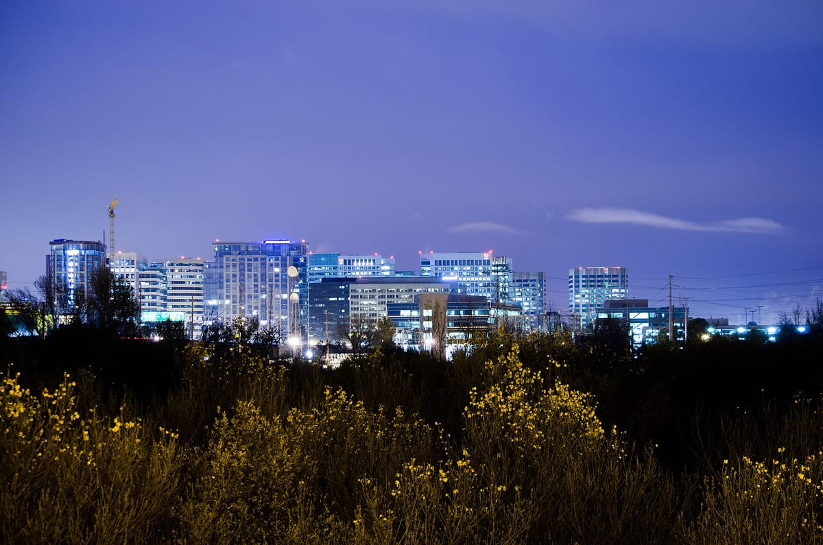 Downtown San Jose's towers lit up at night