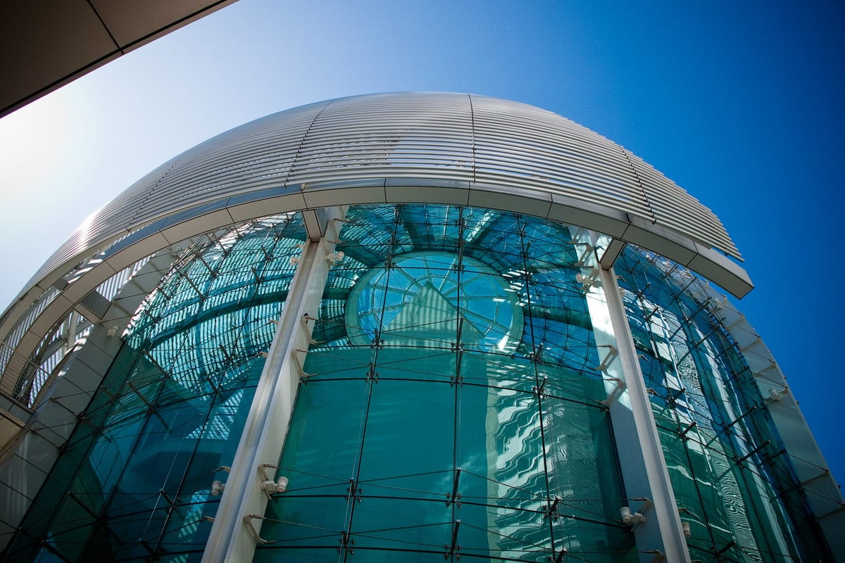 The tower and glass rotunda of San Jose City Hall