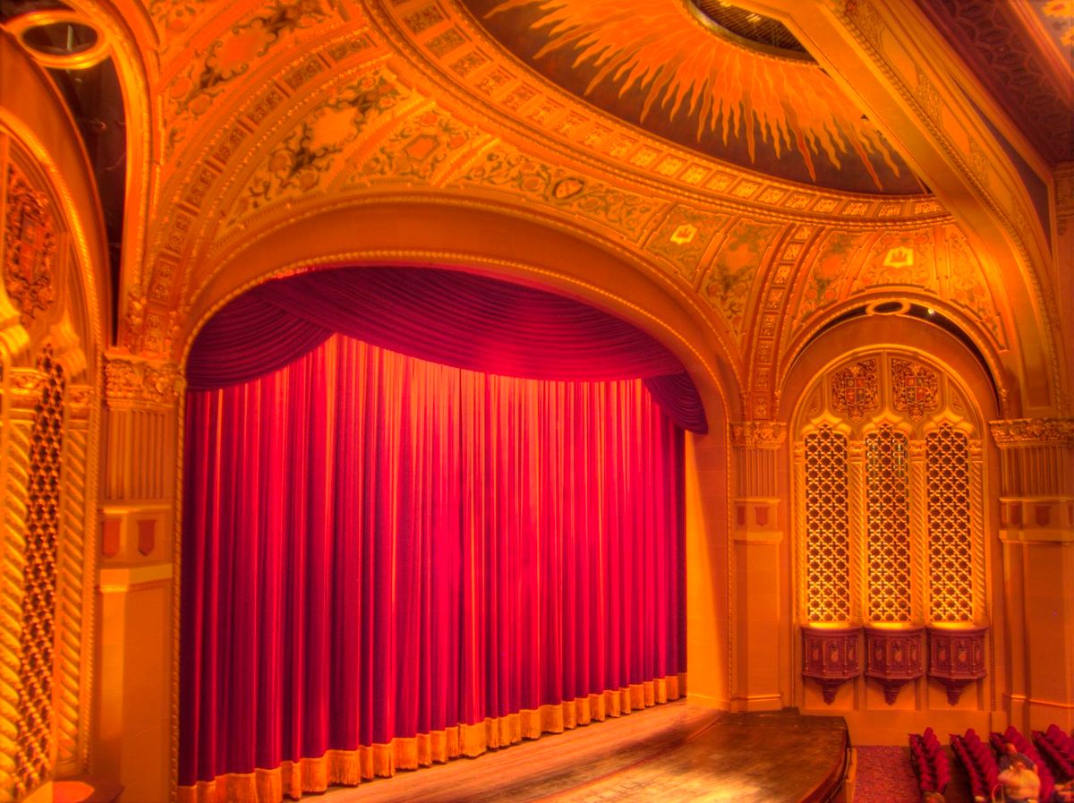 The stage and gilded proscenium inside the California Theatre